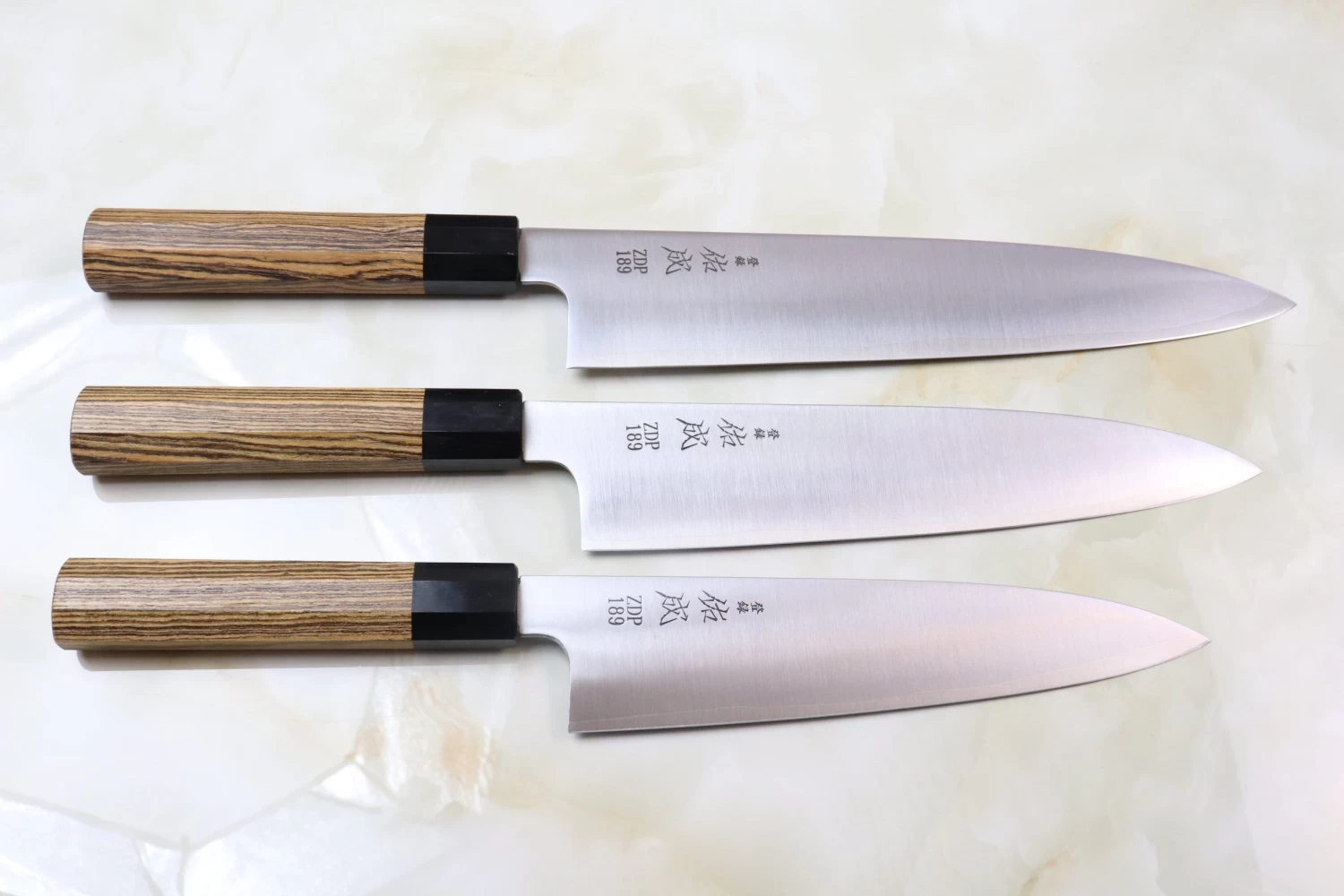 Sukenari ZDP-189 Wa Series Wa Gyuto (210mm To 270mm, 3 Sizes, Octagonal Bocote Wood Handle With Water Buffalo Horn Ferrule) 8 Sukenari ZDP-189 Wa Series Wa Gyuto (210mm To 270mm, 3 Sizes, Octagonal Bocote Wood Handle With Water Buffalo Horn Ferrule) - Image 8